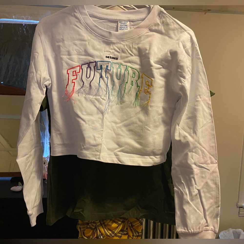 Thin long sleeve shirt. Size L but fits like a med/small.